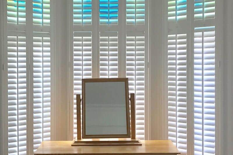 Bay Window Shutters Full Height 76mm Hidden pure white MDF Bedroom