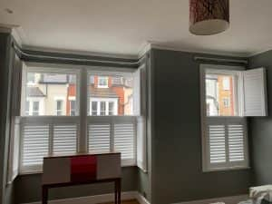 Tier-on-Tier Hardwood Shutters Open